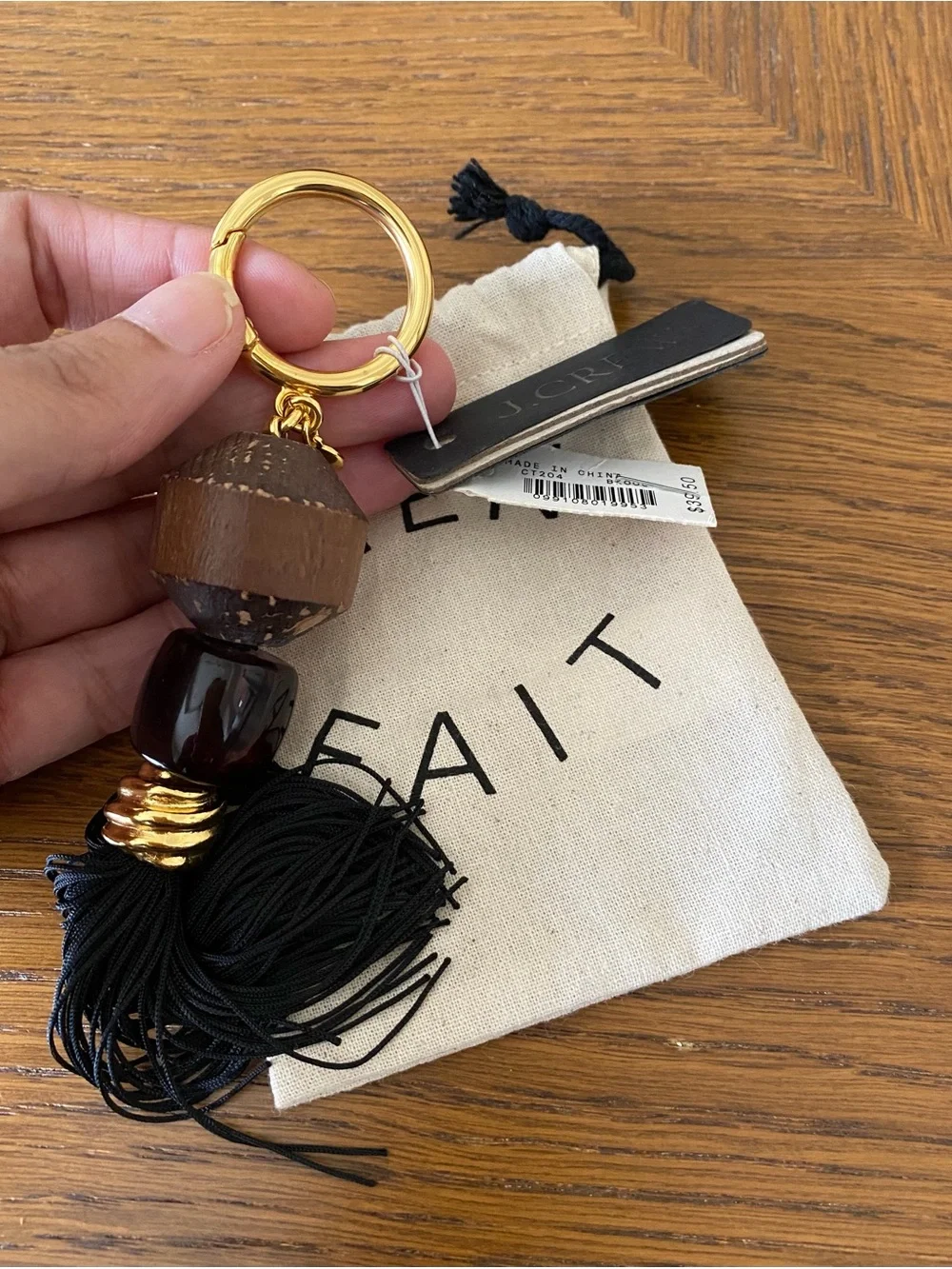 J. Crew Black Tassel Keychain Bag Charm with Gold, Stone, & Brown Accents